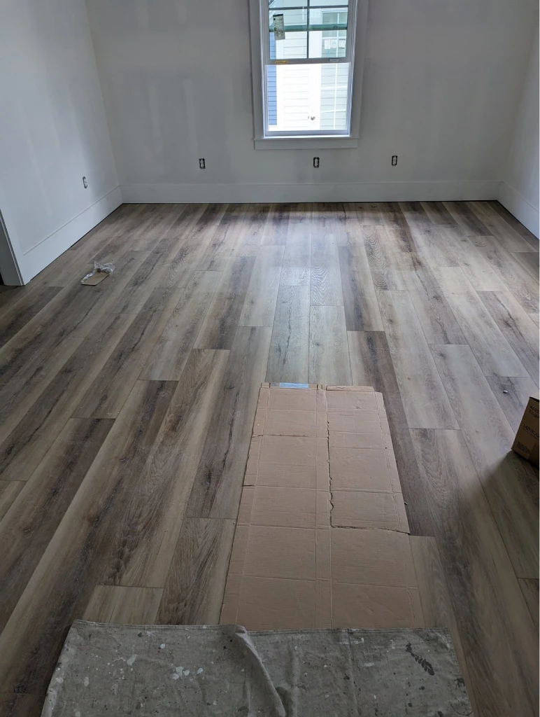 Seamless laminate floor installation.