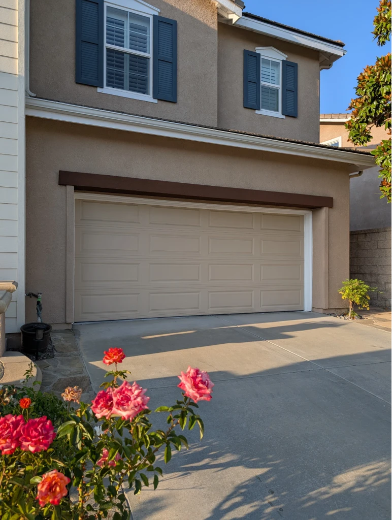 Freshly painted garage door area – quality exterior painting service